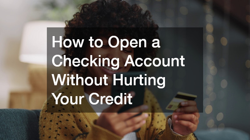 woman holding her checking account card